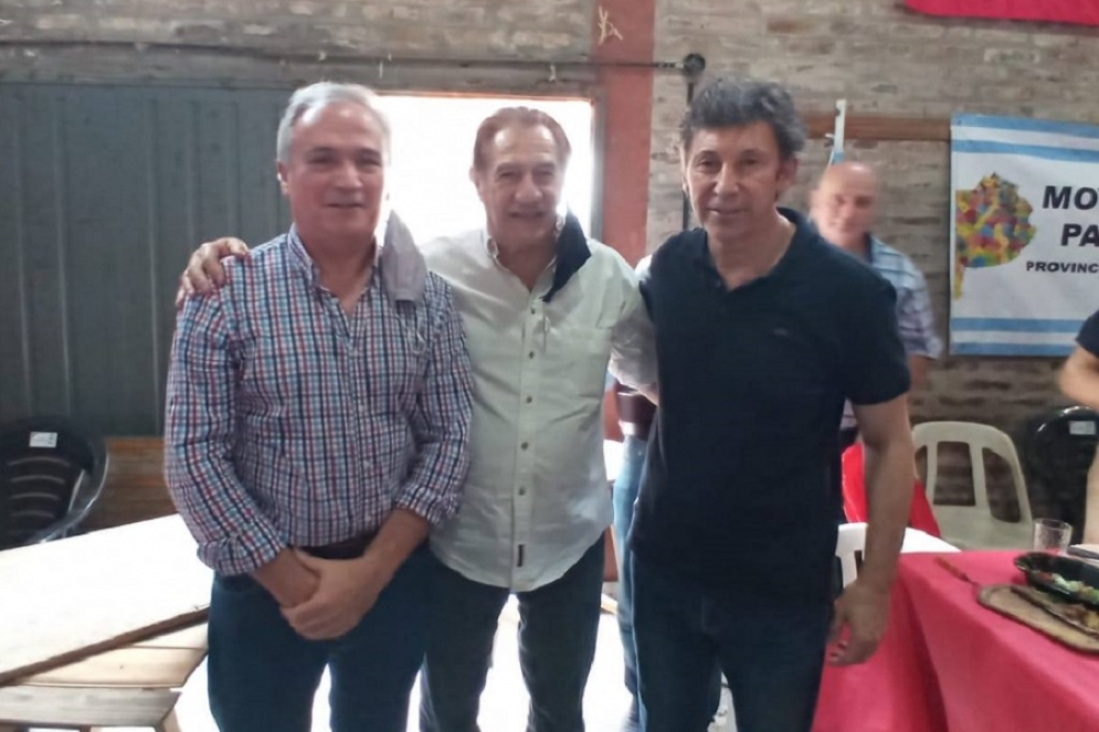 Rizzi junto a Federico Storani y el intendete Gustavo Posse. 