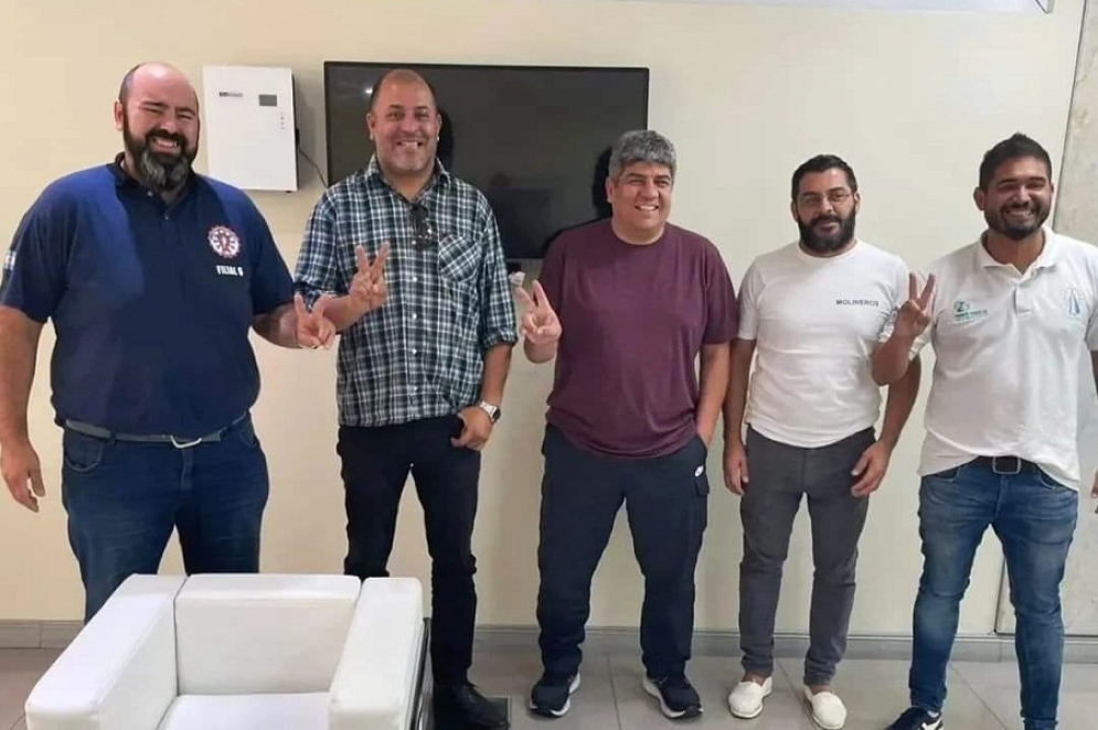 Clavero, Dardo Mansilla, Delegado Regional del Ministerio de Trabajo de la provincia, Moyano, Mario Villalba, de UOMA, y Lucas Granada.